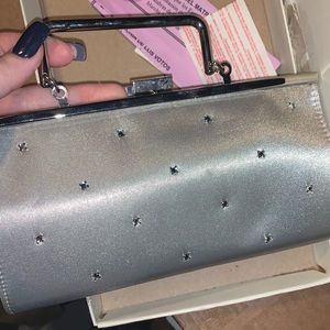 Silver clutch. Heals woman 8.5 Sam & Libby.